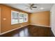 Bright living room featuring hardwood floors and large windows at 690 Green Acres Se Rd, Smyrna, GA 30080