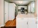 Modern kitchen with white cabinets and stainless steel appliances at 690 Green Acres Se Rd, Smyrna, GA 30080