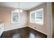 Spacious dining room with hardwood floors and lots of natural light at 690 Green Acres Se Rd, Smyrna, GA 30080