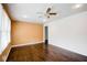 Bright living room with hardwood floors and ceiling fan at 690 Green Acres Se Rd, Smyrna, GA 30080