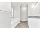 Updated bathroom features a soaking tub, modern vanity, and tile flooring at 2146 Silva Ct, Conley, GA 30288