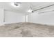 Clean and bright two-car garage with overhead storage at 2146 Silva Ct, Conley, GA 30288