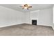 Living room with fireplace and neutral color palette at 2146 Silva Ct, Conley, GA 30288