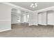 Open dining room with grey wood-look floors at 2146 Silva Ct, Conley, GA 30288