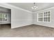 Spacious dining room with large window and hardwood floors at 2146 Silva Ct, Conley, GA 30288