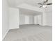 Large main bedroom with grey carpet and access to other rooms at 2146 Silva Ct, Conley, GA 30288