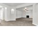 Open living room featuring a fireplace and neutral decor at 2146 Silva Ct, Conley, GA 30288