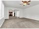 Open concept living room with view into the kitchen at 2146 Silva Ct, Conley, GA 30288