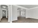 Bright and airy entryway with archways leading to other rooms at 2146 Silva Ct, Conley, GA 30288