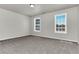 Spacious bedroom with gray carpet and neutral walls at 2146 Silva Ct, Conley, GA 30288