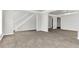 Open concept living room with grey floors at 2146 Silva Ct, Conley, GA 30288