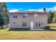 Two-story house with backyard and patio at 2146 Silva Ct, Conley, GA 30288