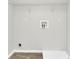 Laundry area with hookups and shelving at 2146 Silva Ct, Conley, GA 30288
