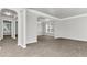 Spacious living room with grey wood-look floors at 2146 Silva Ct, Conley, GA 30288