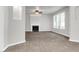 Spacious living room with fireplace and ceiling fan at 2146 Silva Ct, Conley, GA 30288