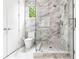 Bathroom with walk-in shower and marble tile at 1137 Ponce De Leon Ne Ave # 1, Atlanta, GA 30306