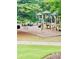 playground with play structures and slides at 306 Mountain Laurel Walk, Canton, GA 30114