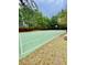 Outdoor basketball court with a bench nearby at 306 Mountain Laurel Walk, Canton, GA 30114