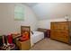 Cozy bedroom with a double bed and wooden dresser at 981 Cranbrook Glen Ln, Snellville, GA 30078