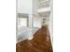 Two-story foyer with hardwood floors and columns at 310 Haley Cir, Atlanta, GA 30349