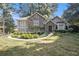 House exterior showcasing stone accents and manicured landscaping at 6280 Wiscasset Nw Pkwy, Dallas, GA 30157