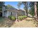 Gray house exterior with a deck and lush greenery at 6280 Wiscasset Nw Pkwy, Dallas, GA 30157