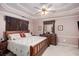 Spacious main bedroom with a ceiling fan and ample closet space at 6280 Wiscasset Nw Pkwy, Dallas, GA 30157