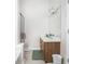 Clean bathroom with a large mirror and a vanity with wood cabinets at 6280 Wiscasset Nw Pkwy, Dallas, GA 30157