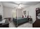Cozy bedroom featuring a double bed, ceiling fan, and ample closet space at 6280 Wiscasset Nw Pkwy, Dallas, GA 30157