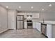 Modern kitchen with granite countertops and stainless steel appliances at 4433 Pinscher St, Union City, GA 30291