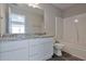 Bathroom with granite countertop, double vanity, and a tub shower combination at 4433 Pinscher St, Union City, GA 30291