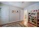 Charming bedroom with built-in shelves, hardwood floors and access to a full bath at 294 Puckett Se Rd, Emerson, GA 30137