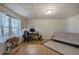 Finished basement with a workspace, futon and plenty of natural light at 294 Puckett Se Rd, Emerson, GA 30137