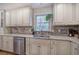 Kitchen boasts granite countertops and stainless steel appliances at 294 Puckett Se Rd, Emerson, GA 30137