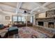 Spacious living room featuring a stone fireplace and hardwood floors at 294 Puckett Se Rd, Emerson, GA 30137
