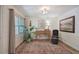 Sitting area with hardwood floors, rug, and window with curtains at 294 Puckett Se Rd, Emerson, GA 30137