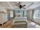 Spacious main bedroom with a coffered ceiling, hardwood floors, and large windows at 294 Puckett Se Rd, Emerson, GA 30137