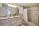Bathroom features double vanity, granite countertops, and a large shower at 294 Puckett Se Rd, Emerson, GA 30137