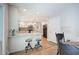 Kitchen features a breakfast bar with two stools, granite countertops, and hardwood floors at 294 Puckett Se Rd, Emerson, GA 30137