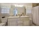 Bathroom boasts double vanity with granite countertops and a shower at 294 Puckett Se Rd, Emerson, GA 30137
