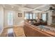 Spacious living room with a cozy fireplace, hardwood floors, and coffered ceilings at 294 Puckett Se Rd, Emerson, GA 30137