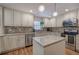 Updated kitchen, granite counters, island, and stainless steel appliances at 294 Puckett Se Rd, Emerson, GA 30137