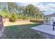 Spacious backyard with a large patio and wooden fence at 6019 Wheeler Ridge Rd, Auburn, GA 30011
