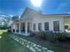 Community center with a large porch and stone pathway at 6019 Wheeler Ridge Rd, Auburn, GA 30011