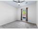 Spacious bedroom with neutral carpeting and a large window at 6019 Wheeler Ridge Rd, Auburn, GA 30011