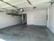 Attached garage with overhead storage and extra space at 6019 Wheeler Ridge Rd, Auburn, GA 30011