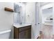 Clean bathroom with dark brown vanity and white countertop at 6019 Wheeler Ridge Rd, Auburn, GA 30011