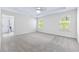 Spacious bedroom with carpet flooring and ensuite bathroom access at 6019 Wheeler Ridge Rd, Auburn, GA 30011