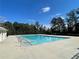 Inviting community swimming pool with plenty of deck space at 6019 Wheeler Ridge Rd, Auburn, GA 30011