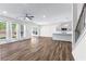 Spacious living room with hardwood floors, lots of natural light and an open concept floorplan at 6019 Wheeler Ridge Rd, Auburn, GA 30011
